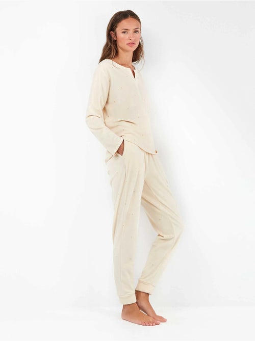 Pijama largo de lunares en tejido polar elástico - Kiabi Pijama largo de lunares en tejido polar elástico - Kiabi