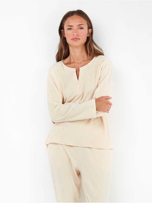 Pijama largo de lunares en tejido polar elástico - Kiabi Pijama largo de lunares en tejido polar elástico - Kiabi