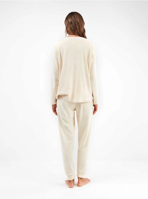 Pijama largo de lunares en tejido polar elástico - Kiabi Pijama largo de lunares en tejido polar elástico - Kiabi