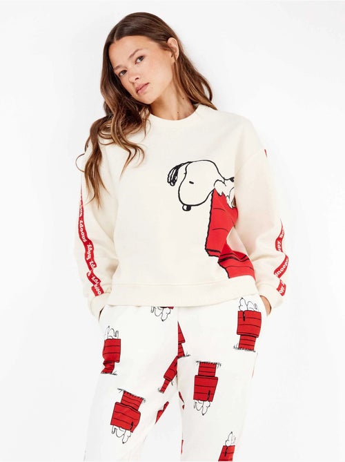 Pijama largo snoopy de felpa elástica con interior suave - Kiabi Pijama largo snoopy de felpa elástica con interior suave - Kiabi