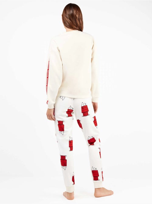 Pijama largo snoopy de felpa elástica con interior suave - Kiabi Pijama largo snoopy de felpa elástica con interior suave - Kiabi