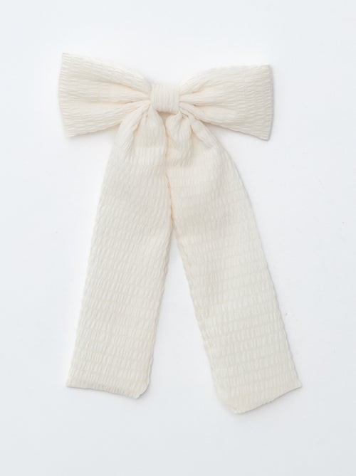 Pinza de cocodrilo con lazo fantasía y cinta - Kiabi