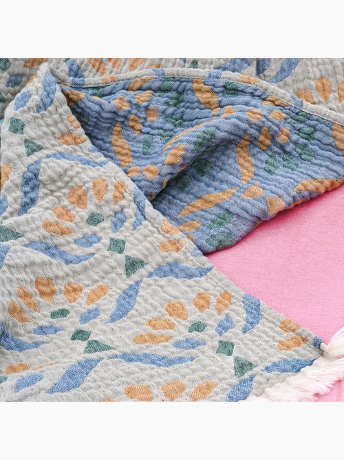 Plaid de gasa de algodón lavado con motivo vegetal - Kiabi Plaid de gasa de algodón lavado con motivo vegetal - Kiabi