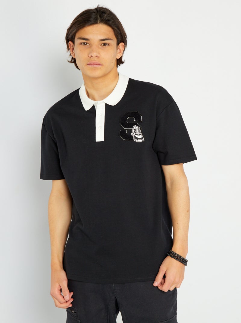 Polo con bordado en el pecho NEGRO - Kiabi