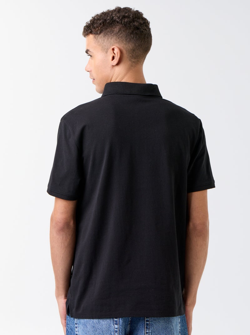 Polo con cuello de cremallera Negro - Kiabi