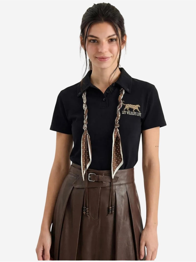 Polo con estampado de texto bordado lucci Negro - Kiabi