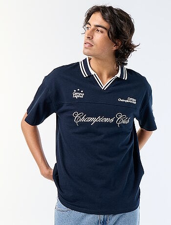 Polo con inscripciones bordadas de manga corta