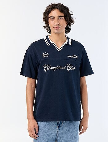 Polo con inscripciones bordadas de manga corta