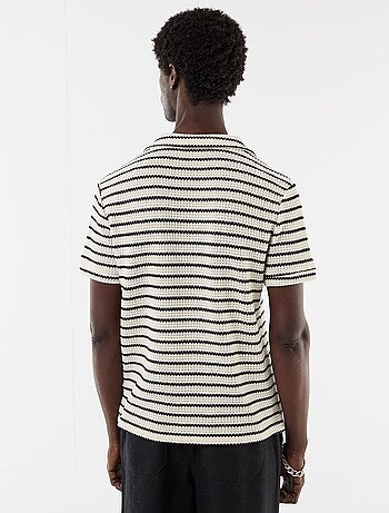 Polo de manga corta en material de fantasía