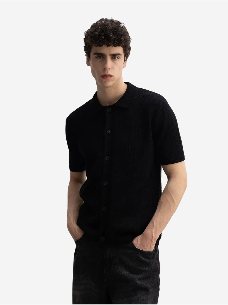 Polo de manga corta en punto texturizado para hombre giesto Negro - Kiabi