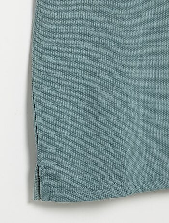 Polo de nido de abeja con cuello de cremallera