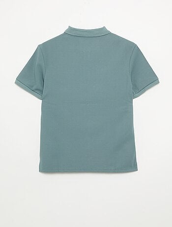 Polo de nido de abeja con cuello de cremallera