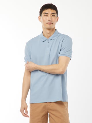 Polo de panal de abeja con cremallera en el cuello