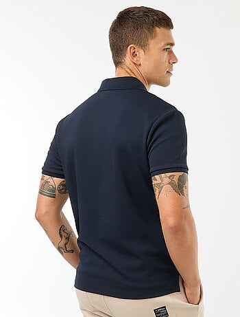 Polo de panal de abeja con cremallera en el cuello