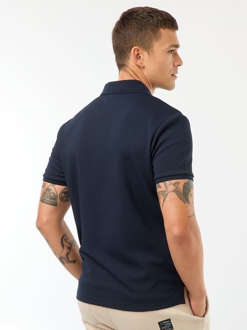 Polo de panal de abeja con cremallera en el cuello - Kiabi Polo de panal de abeja con cremallera en el cuello - Kiabi