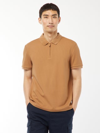 Polo de panal de abeja con cremallera en el cuello