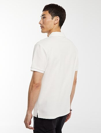 Polo de panal de abeja con cremallera en el cuello