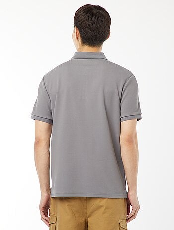 Polo de panal de abeja con cremallera en el cuello