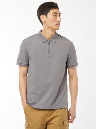 Polo de panal de abeja con cremallera en el cuello