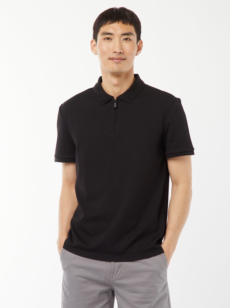 Polo de panal de abeja con cremallera en el cuello negro - Kiabi