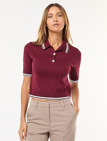 Polo de punto acanalado con cuello con botones dorados