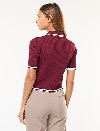 Polo de punto acanalado con cuello con botones dorados