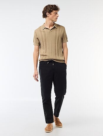 Polo de punto con efecto tricot