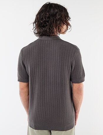 Polo de punto con efecto tricot