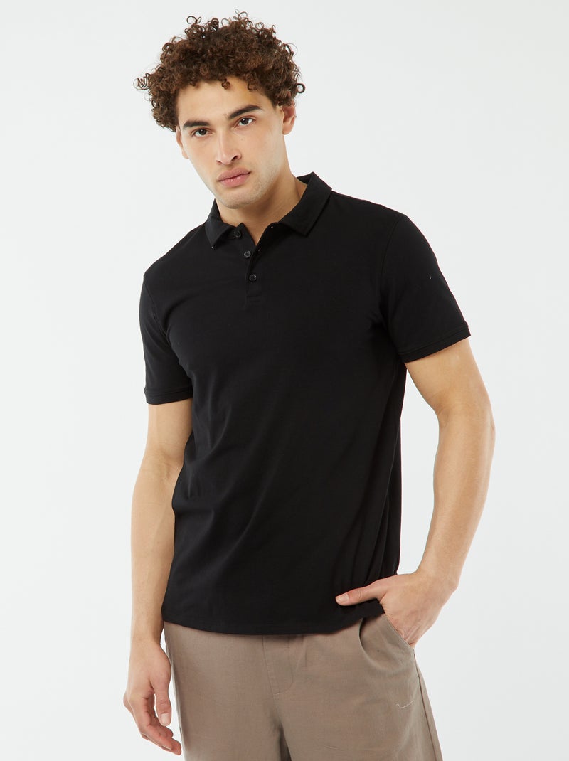 Polo de punto liso con manga corta negro - Kiabi
