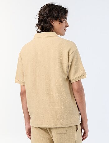 Polo de tejido de fantasía de manga corta