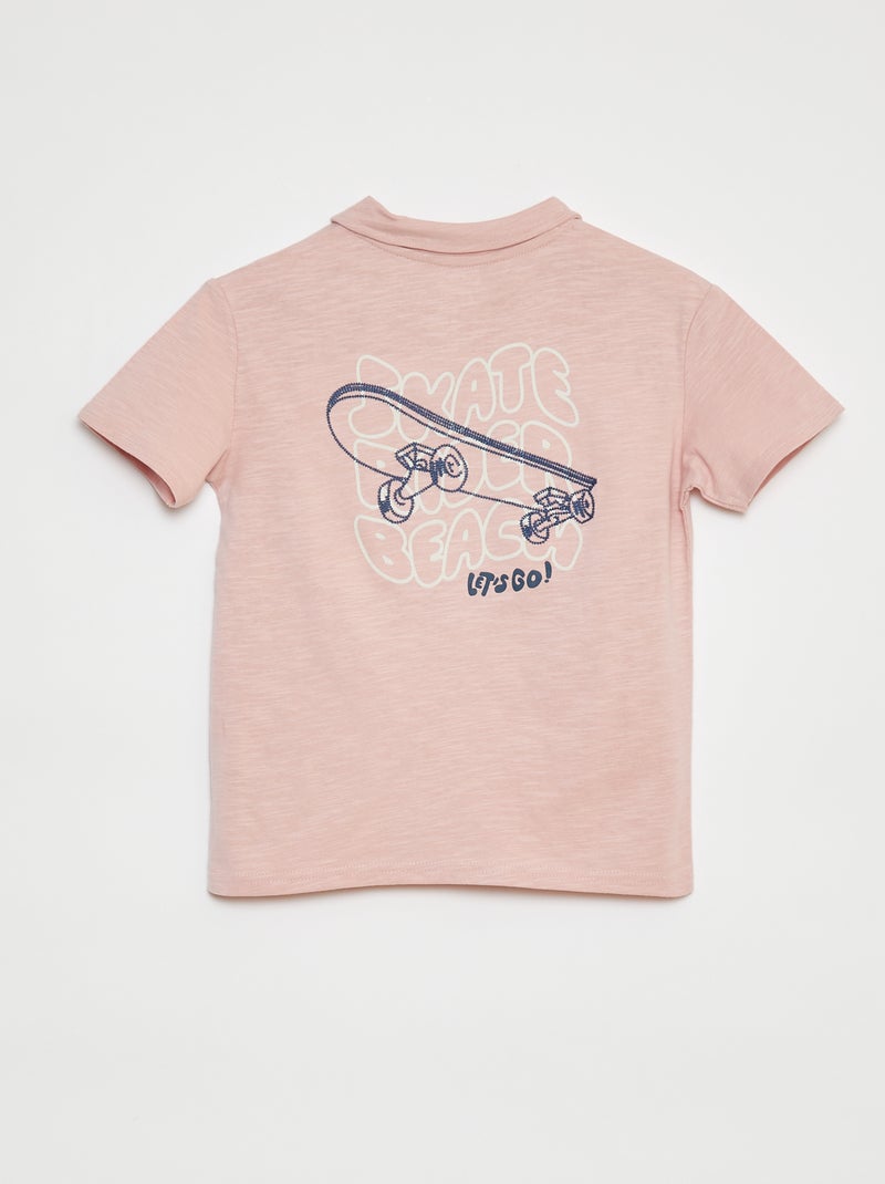 Polo liso con estampado ROSA - Kiabi