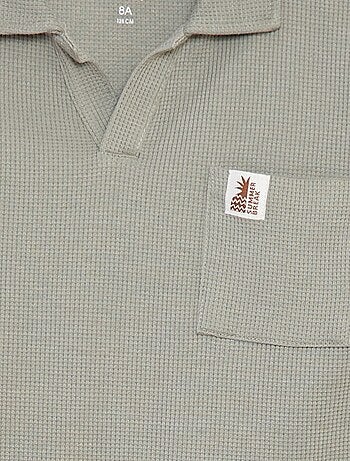 Polo loose con bolsillo