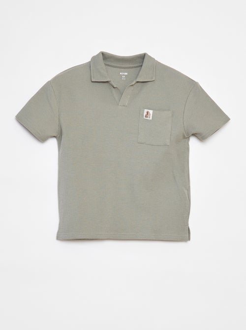 Polo loose con bolsillo - Kiabi