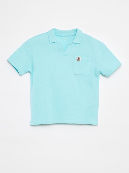 Polo loose con bolsillo - Kiabi