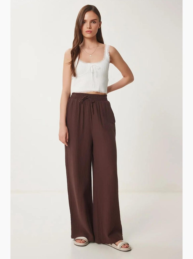 Preciosos pantalones estambul de pierna ancha con cordón y detalle de ribete. Istanbul Marrón - Kiabi