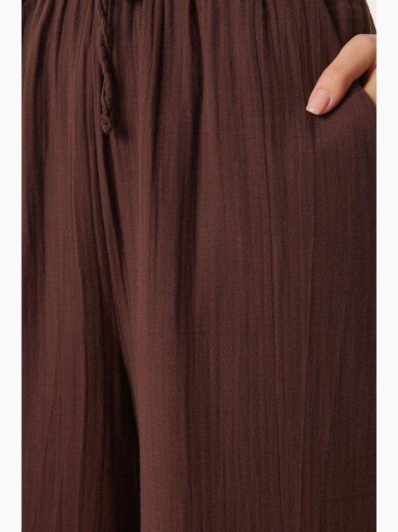 Preciosos pantalones estambul de pierna ancha con cordón y detalle de ribete. Istanbul Marrón - Kiabi