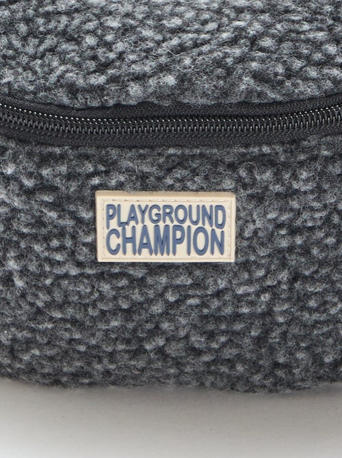 Riñonera lisa efecto borreguito 27x15 cm - Kiabi