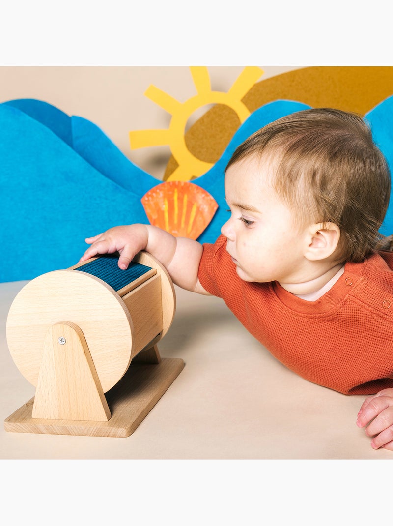 Rueda sensorial de madera para bebé | Petit Boum Azul - Kiabi