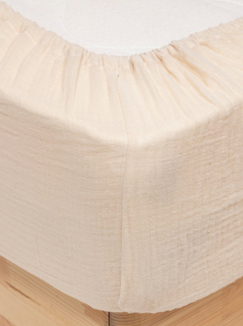 Sábana ajustable en gasa de algodón Beige - Kiabi