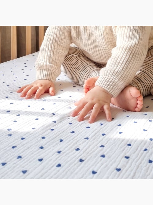 Sábana ajustable para moisés de bebé en algodón | SEVIRA KIDS - Kiabi Sábana ajustable para moisés de bebé en algodón | SEVIRA KIDS - Kiabi