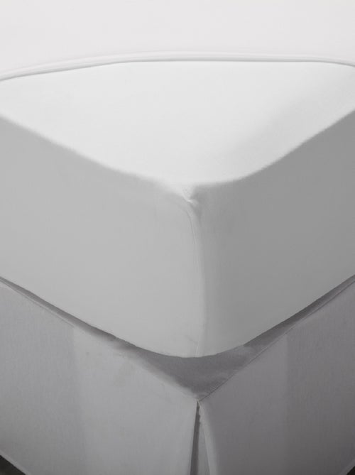 Sábana bajera 100% algodón - HOME -Ajustable - Transpirable - Kiabi Sábana bajera 100% algodón - HOME -Ajustable - Transpirable - Kiabi