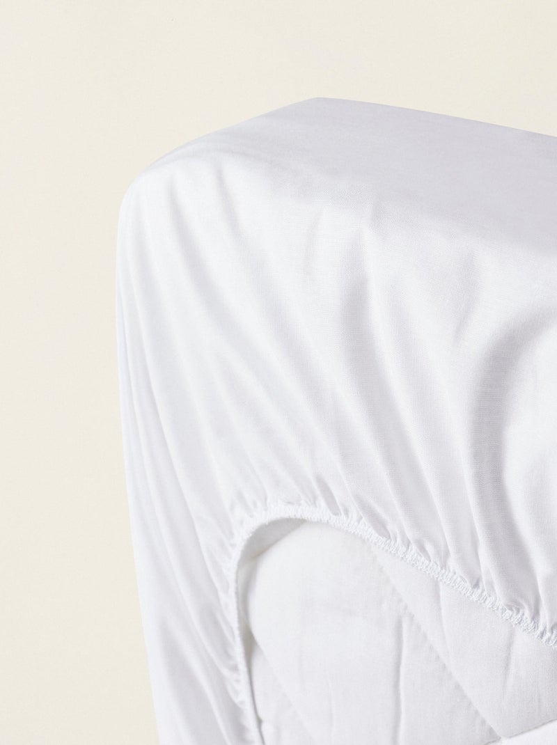 Sábana bajera 2 en 1 y protector de colchón impermeable 60x120 cm Blanco - Kiabi