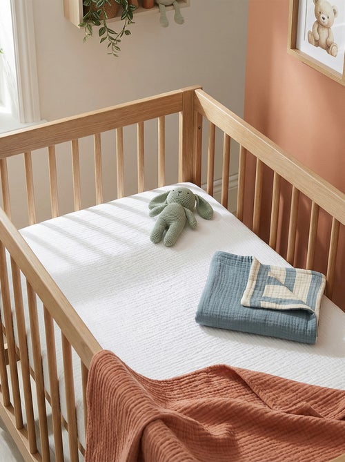 Sábana bajera ajustable para cuna (70x140) en doble gasa de algodón - Kiabi Home - Kiabi Sábana bajera ajustable para cuna (70x140) en doble gasa de algodón - Kiabi Home - Kiabi