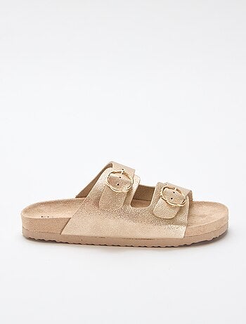 Sandalias doradas con hebilla de flores