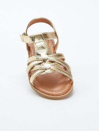 Sandalias doradas multitiras
