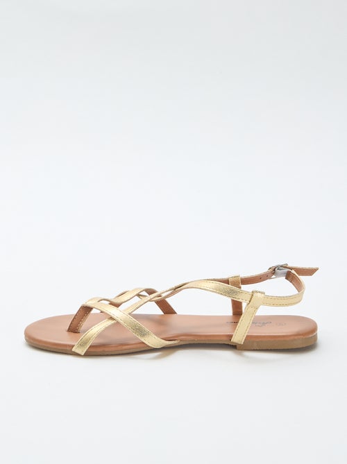 Sandalias planas con tira cruzada entre los dedos - Kiabi