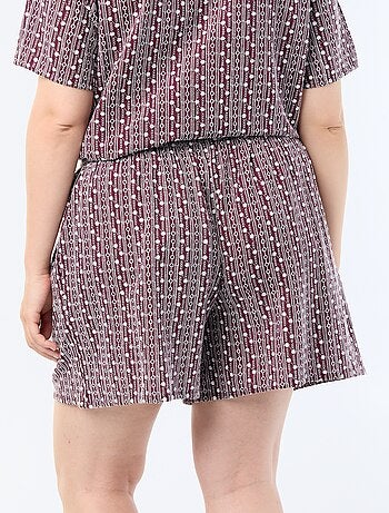 Short ancho con estampados bordados