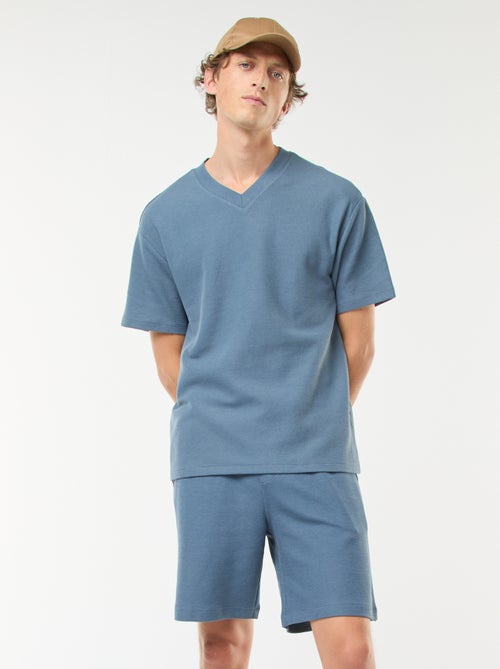 Short deportivo con bolsillos de punto - Kiabi