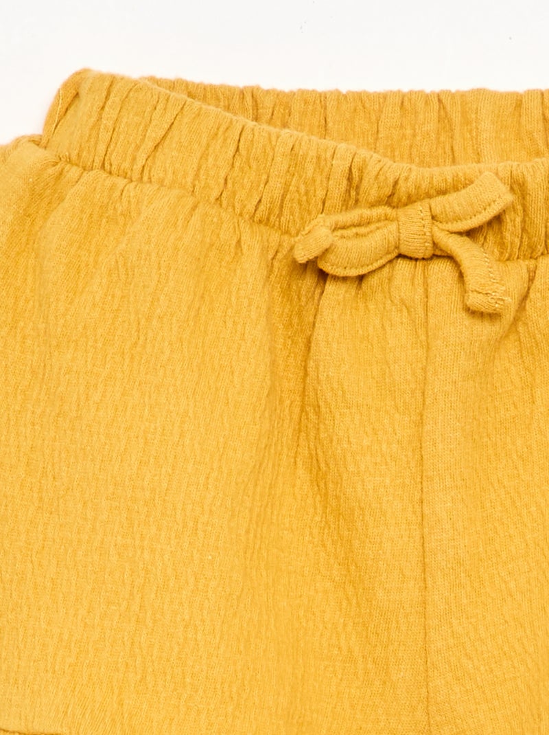 Short liso de punto arrugado Amarillo - Kiabi