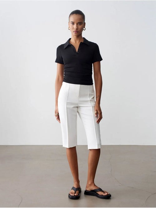 Shorts capri rectos de tiro alto con abertura - Kiabi Shorts capri rectos de tiro alto con abertura - Kiabi